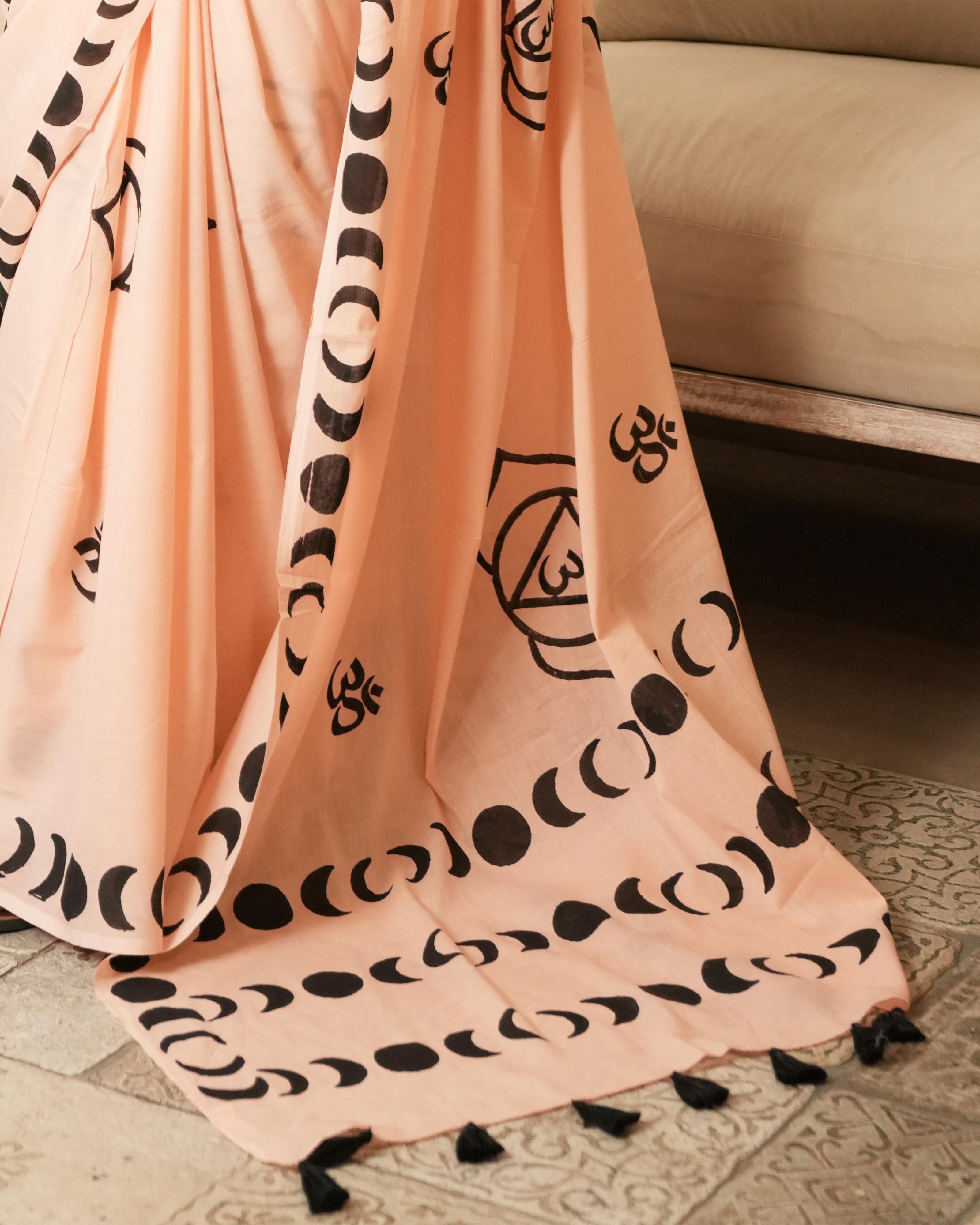 Handblock Print Mul Cotton Saree | Peach Crescent Om Black Tassel for Spiritual & Festive Wear